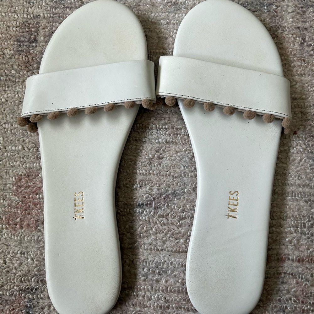 TKEES Cream Slide Sandals with Tan Pom Detail